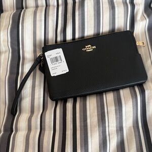 Coach Black Leather Wristlet with Gold Accents